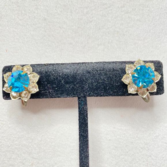 Tiny Flower Stud Earrings Central Blue Clear Rhinestones Silver Tone Setting - Picture 1 of 8